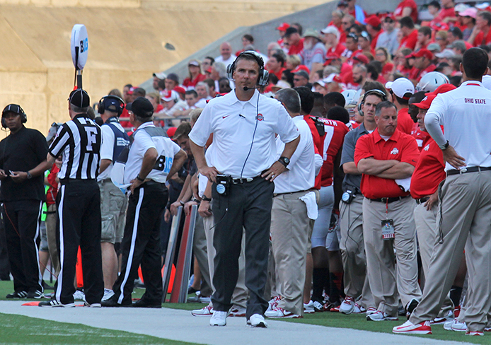 Coach Urban Meyer stands on the sidelines during a game against San Diego. OSU won, 42-7. Credit: Shelby Lum / Photo editor