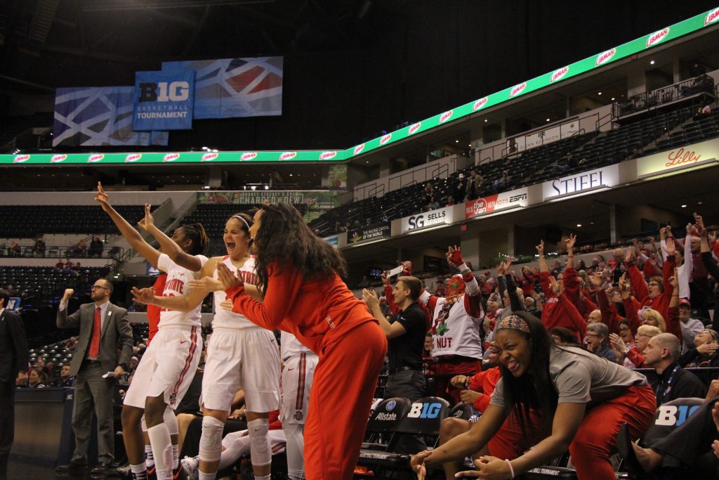 OSU junior forward Alexa Hart (22) and redshirt junior guard Kianna Holland (right) celebrate the team's win on March 3 at the Bankers Life Fieldhouse in Indianapolis. Credit: Ashley Nelson | Sports Director