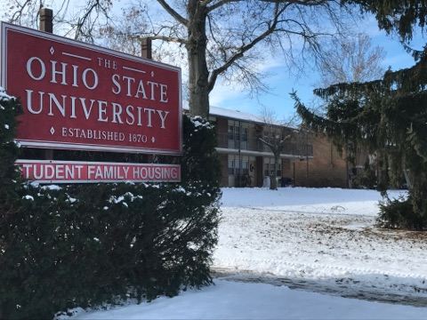 photo of an Ohio State university sign in front of buckeye village