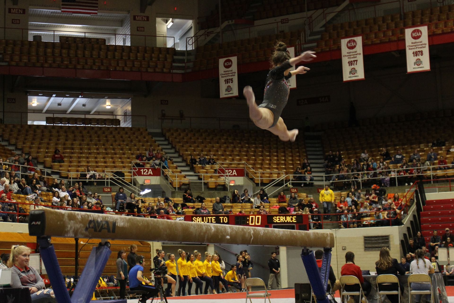 Then-sophomore Morgan Lowe hits a side leap during her balance beam routine at the Ohio State women’s gymnastics meet against West Virginia University and Temple University in St. John Arena on March 2, 2019