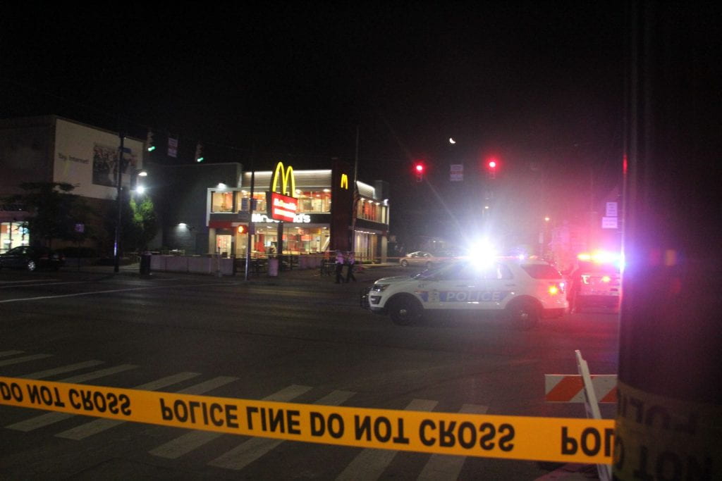 Police block off the intersection of 18th Avenue and High Street following a shooting outside of McDonald's in Columbus on August 25. Credit: Casey Cascaldo | Managing Editor for Multimedia 