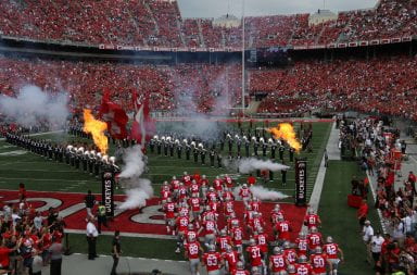 The Buckeyes take to the field prior to the start of the game against Cincinnati in front of an Ohio Stadium filled with fans.