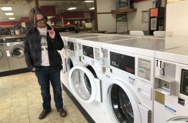Drew Sherrick owner of Dirty Dungarees, explains that this is the last laundromat-pub still open in Columbus. Darby Clark | Lantern Reporter