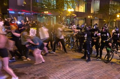 Columbus Police pepper-sprayed protesters Thursday night after a Lime scooter was thrown at police. Credit: Max Garrison | Asst. Campus Editor