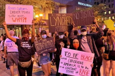 Students from Ohio State and Miami University protested Thursday night on High Street. | Courtesy of Winnie Labissiere
