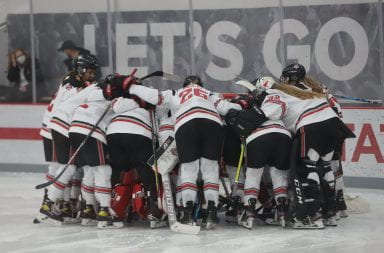 Ohio State women's hockey team huddles before a game