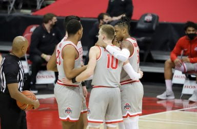 Several Buckeyes huddle up during the Ohio State-Purdue game on Jan. 19