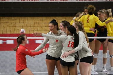 The Ohio State Buckeyes celebrate after a kill