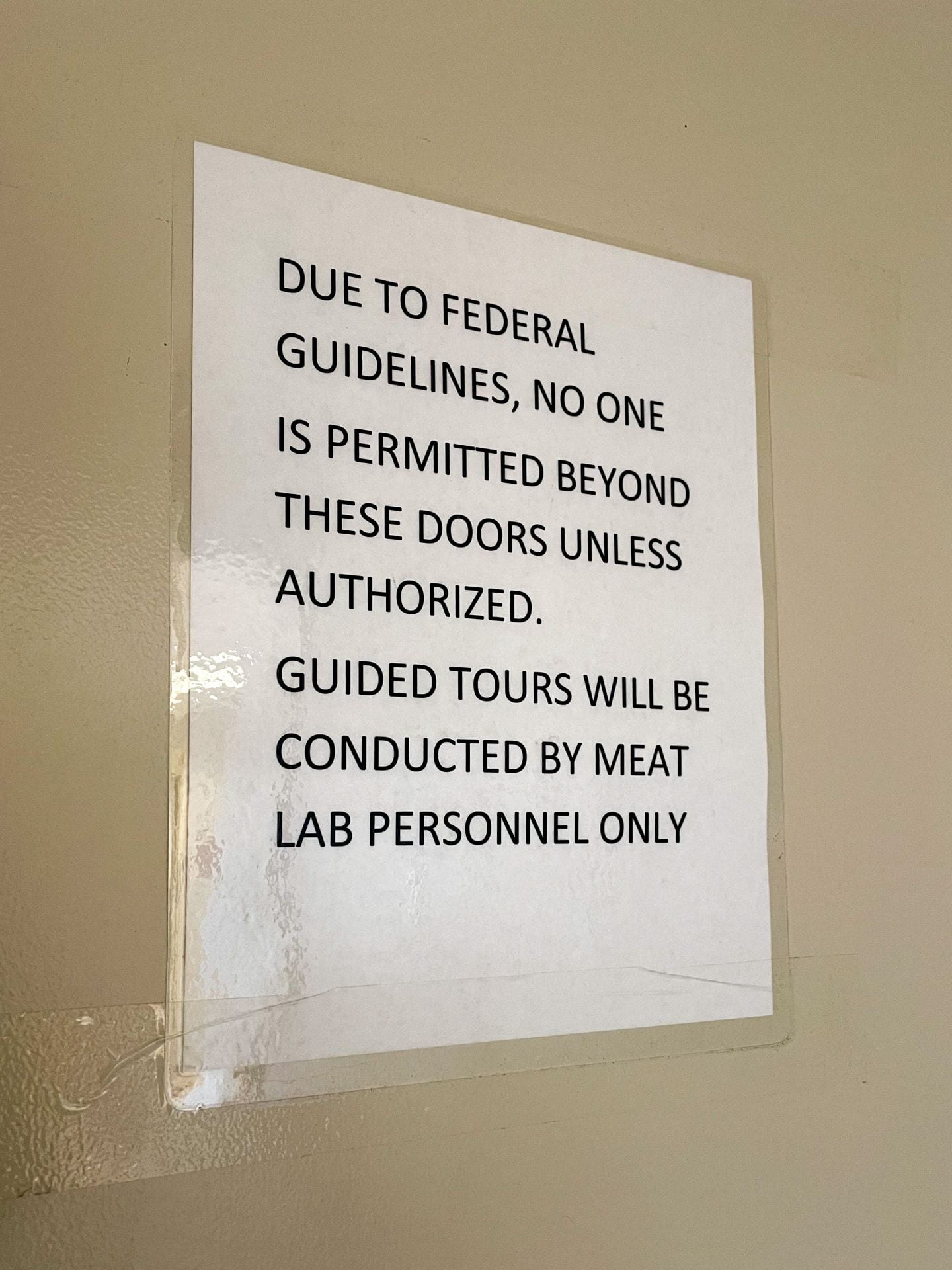 a sign inside the meat lab