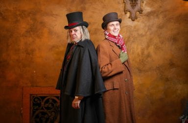 (Left to Right) Thom Christopher Warren as Scrooge and Gregory Mallios as Bob Crachit in Columbus Association for the Performing Arts’ production of “A Christmas Carol.” Credit: Ryan Shreve | Fyrebird Media