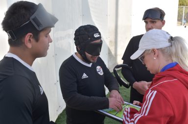 Members of the United States Paralympic Blind Soccer team — who all wear eyeshades to level the playing field, for those who aren’t completely blind — being coached by Katie Smith. Credit: Courtesy of the U.S. Association of Blind Athletes