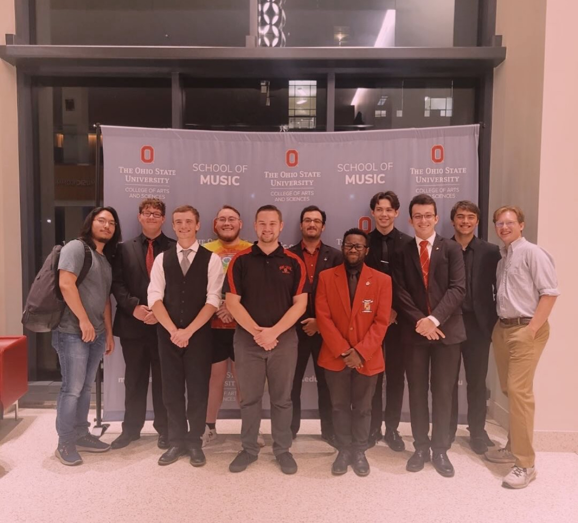 Some brothers of Phi Mu Alpha welcome their new probationary class in October 2023. Credit: Courtesy of Davis Aho