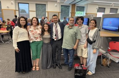Gigi Humeidan and her family at the ECMO Symposium Friday at the Wexner Medical Center. From left to right: Rola Humeidan, Kelly Renee, Gigi Humeidan, Dr. Nakush Mokadom, Monjed Humeidan, Manar Humeidan and Emily Humeidan. Credit: Courtesy of Gigi Humeidan
