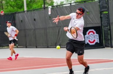 Ohio State fifth-year Justin Boulais returns a shot from Cleveland State freshman Lincoln Battle in his 6-2, 7-0 win. The Buckeyes would go on to sweep the Vikings 4-0 in the contest. Credit: Courtesy of Ohio State Athletics
