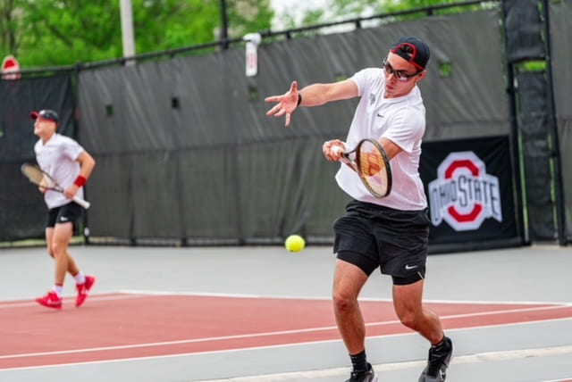 Ohio State fifth-year Justin Boulais returns a shot from Cleveland State freshman Lincoln Battle in his 6-2, 7-0 win. The Buckeyes would go on to sweep the Vikings 4-0 in the contest. Credit: Courtesy of Ohio State Athletics