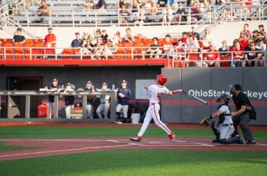 Junior infielder Tyler Pettorini swings and hits a home run during Ohio State's matchup against the University of Akron Wednesday. The Buckeyes beat the Zips 18-13. Credit: Courtesy of Ohio State Athletics
