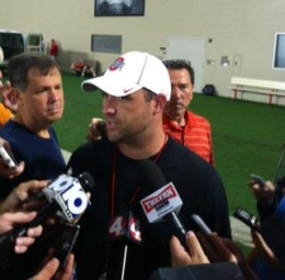 Eric Seger / Sports editor Ohio State wide receivers coach Zach Smith speaks with reporters after practice Aug. 10 at the Woody Hayes Athletic Center.