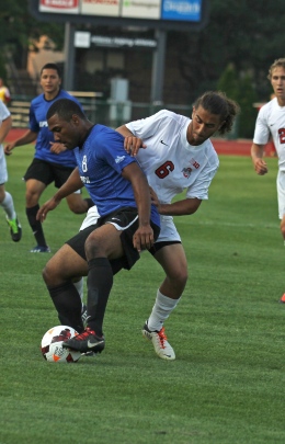 Shelby Lum / Photo editor Junior Yianni Sarris battles for the ball during a game against IPFW on Aug. 20, at Jesse Owens Memorial Stadium. OSU won, 2-0.