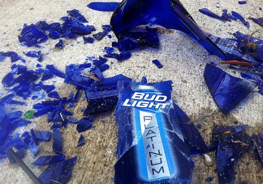 A shattered Bud Light Platinum, found on 14th and Indianola avenues, moments before popping a professor’s tire. Credit: Cory Frame / Lantern reporter 