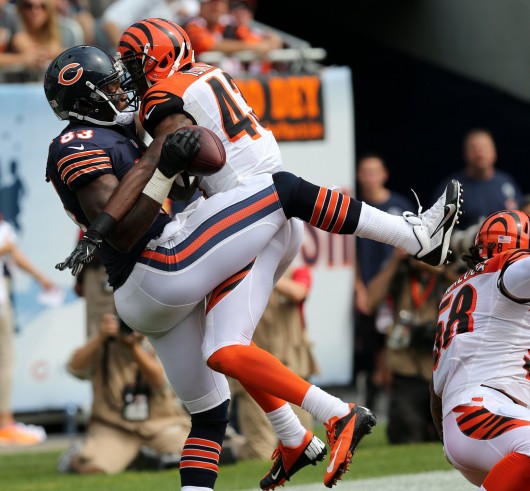 Chicago Bears tight end Martellus Bennett (83) makes a touchdown catch against Cincinnati Bengals free safety George Iloka (43) during the first quarter at Soldier Field in Chicago, Illinois, on Sunday, September 8, 2013. Credit: Courtesy of MCT