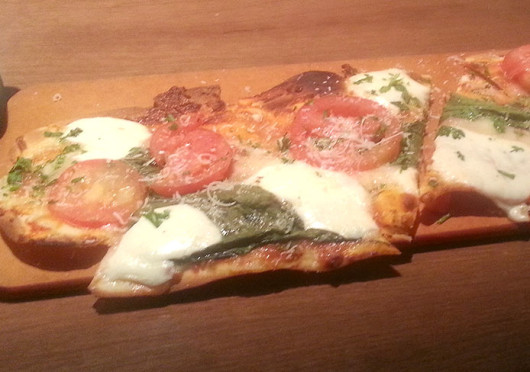 The margherita flatbread at Houlihan's is $9.50. Credit: Kim Dailey