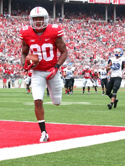 Kaily Cunningham / Multimedia editor Redshirt-senior Chris Fields catches a touchdown during a game against Buffalo Aug. 31, at Ohio Stadium. OSU won, 40-20.