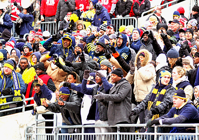 Michigan fans cheer at the football game against OSU at Ohio Stadium Nov. 24, 2012. OSU won, 26-21. Credit: Daniel Chi / For The Lantern
