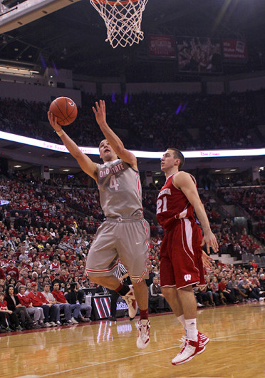 Then-sophomore point guard Aaron Craft (4) tries to score during a game against Wisconsin Feb. 26, 2012, at Value City Arena. OSU lost, 63-60. Credit: For The Lantern