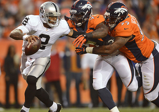 Oakland Raiders quarterback Terrelle Pryor (2) avoids the sack during a game against the Denver Broncos Sept. 23 at Sports Authority Field. Denver won, 37-21. Credit: Courtesy of MCT