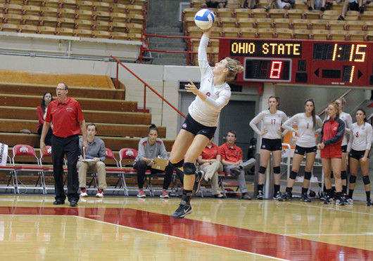Junior setter Taylor Sherwin serves the ball during a match against Dabrowa Sept. 4, at St. John Arena. OSU won, 3-2.