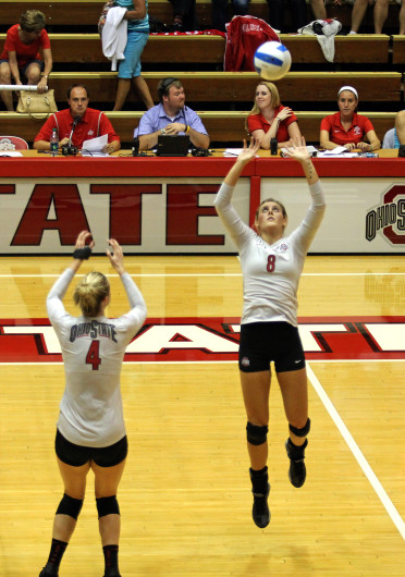 Junior setter Taylor Sherwin sets the ball up for a teammate during a game against Dabrowa Sept. 4, at St. John Arena. OSU won, 3-2. Credit: Shelby Lum / Photo editor
