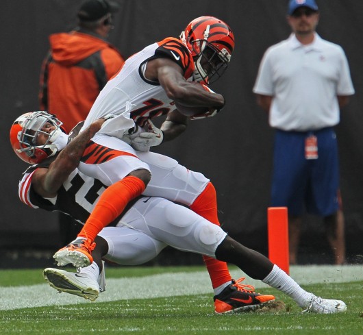Cincinnati Bengals wide receiver A.J. Green, right, is stopped after catching a pass for a short gain by Cleveland Browns defensive back Joe Haden at FirstEnergy Stadium Sunday, Sept. 29. The Browns won, 17-6. Credit: Courtesy of MCT