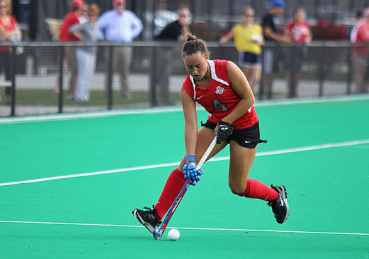 Junior back Carly Mackessy (4) controls the ball during a game against Louisville Oct. 1 at Buckeye Varsity Field. OSU lost, 6-3. Credit: Shelby Lum / Photo editor