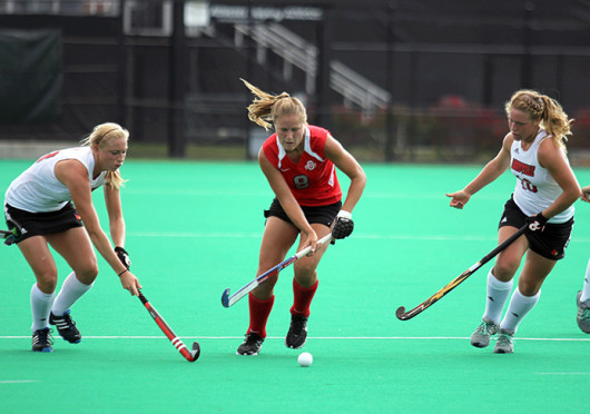 Senior midfielder Mona Frommhold (8) plays the ball forward during a game against Louisville Oct. 1 at Buckeye Varsity Field. OSU lost, 6-3. Credit: Shelby Lum / Photo editor