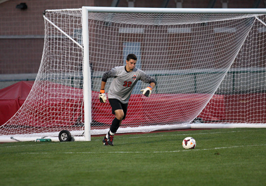 Redshirt-junior goalkeeper Alex Ivanov prepares to take a free kick during a match against Wright State Sept. 17 at Jesse Owens Memorial Stadium. The teams tied, 0-0. Credit: Shelby Lum / Photo editor