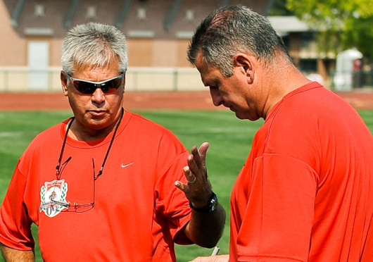 Men’s soccer coaches John Bluem (left) and Frank Speth discuss strategy before a game against Cal State Fullerton Sept. 6, 2009, at Jesse Owens Memorial Stadium. OSU won, 1-0. Credit: Courtesy of OSU athletics