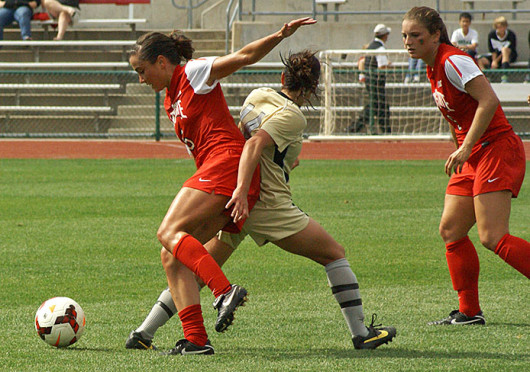 Junior midfielder Ellyn Gruber (5) fights off a defender during a match against Purdue Sept. 29 at Jesse Owens Memorial Stadium. OSU lost, 1-0. Credit: Michele Theodore / Copy chief