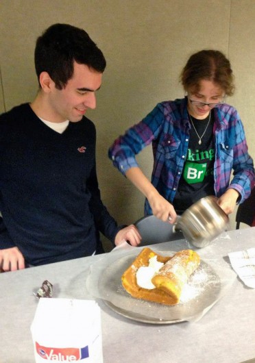 OSU Bread Club members Michael Mascolino (left) and Erica Cramer, primary leader of the club, make a pumpkin roll.  Credit: Courtesy of Matthew Pham