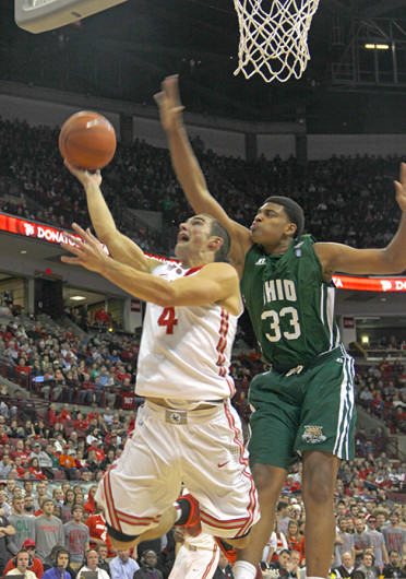 Senior guard Aaron Craft (4) attempts a lay up during a game against Ohio Nov. 12 at the Schottenstein Center. OSU won, 79-69. Credit: Ritika Shah / Asst. photo editor
