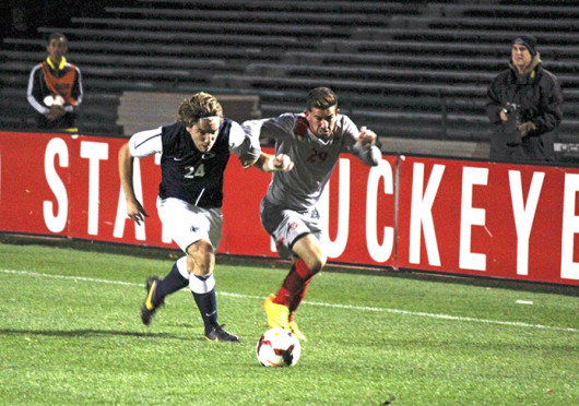 Junior midfielder Max Moller (29) attempts to beat his defender during a match against Penn State Nov. 2 at Jesse Owens Memorial Stadium. OSU won, 1-0. Credit: Sally Xia / Lantern photographer