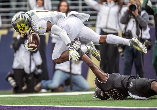 Oregon senior wide receiver Josh Huff (1) dives for the end zone during a game against Washington Oct. 12 at Husky Stadium. Oregon won, 45-24. Credit: Courtesy of MCT
