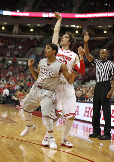 Sophomore guard Amedeo Della Valle (33) watches his shot during an exhibition game against Walsh Nov. 3 at the Schottenstein Center. OSU won, 93-63. Credit: Kelly Roderick / For The Lantern
