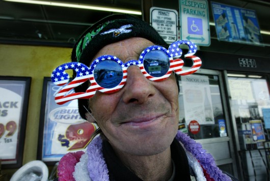 John White, of Camden, N.J., models the 2003 glasses he is selling at Canal's Discount in Pennsauken, N.J., Dec. 30, 2002. Credit: Courtesy of MCT