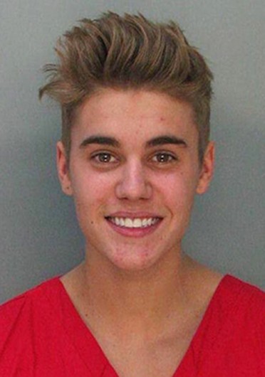 Justin Bieber's mugshot. The singer was arrested early morning Jan. 23 for resisting arrest without violence, driving under the influence and driving with an expired license. 