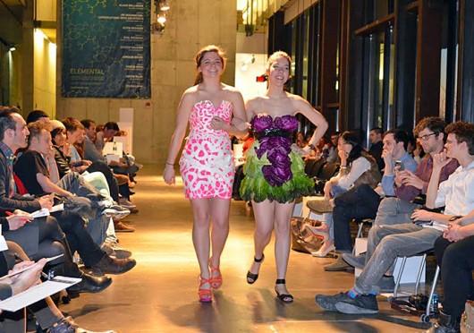 Kelsey Sellenraad (left) and Cheyenne Vandevode, both third-years in architecture, walk down the catwalk at the 2013 Fashion Schau at the Knowlton School of Architecture.  Credit:  Courtesy of Chris Mannella  