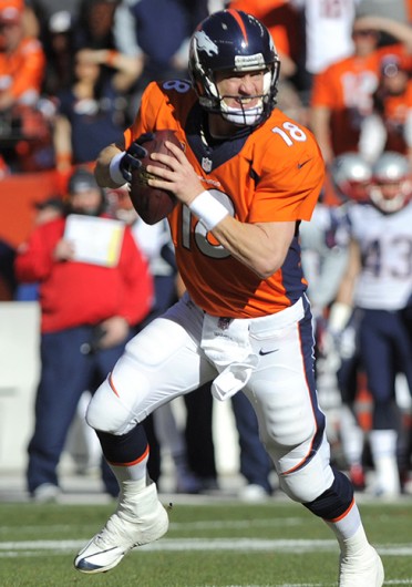 Denver Broncos quarterback Peyton Manning scans the field during the AFC championship game against the New England Patriots Jan. 19 at Sports Authority Field at Mile High. Denver won, 26-16. Courtesy of MCT
