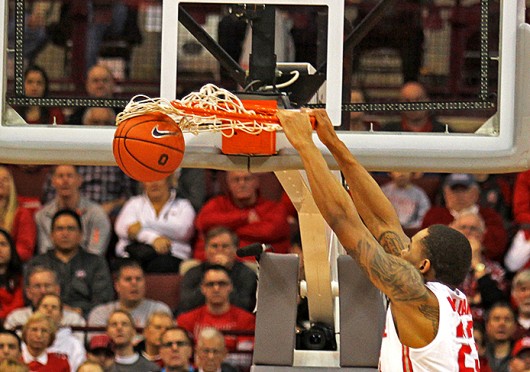 Junior center Amir Williams dunks the ball during a game against Iowa Jan. 12 at the Schottenstein Center. OSU lost, 84-74. Credit: Shelby Lum / Photo editor