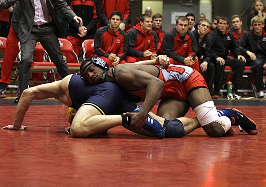 Sophomore Matt Martin takes down his opponent during a match against Michigan Jan. 31 at St. John Arena. OSU lost, 21-12. Credit Shelby Lum / Photo editor