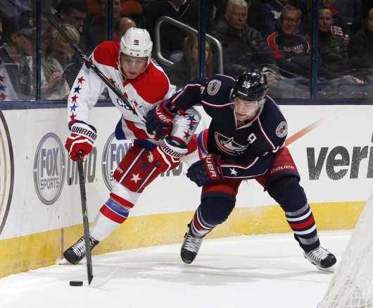 Columbus Blue Jackets forward Mark Letestu (55) fights for the puck during a game against the Washington Capitals Jan. 29 at Nationwide Arena. The Blue Jackets won, 5-2. Courtesy of MCT