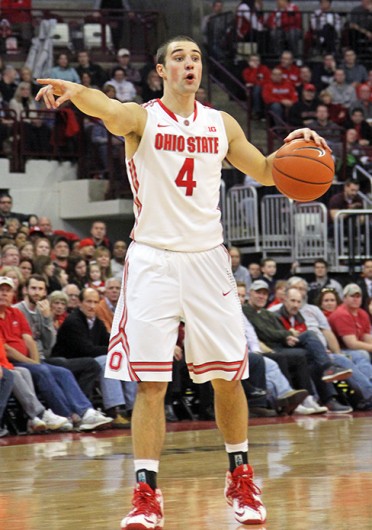 Senior guard Aaron Craft directs the offense during a game against Minnesota Feb. 22 at the Schottenstein Center. OSU won, 64-46. Credit: Ritika Shah / Asst. photo editor